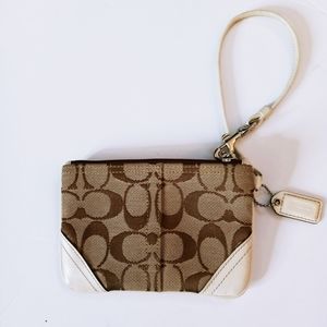 Coach Brown and Tan Jacquard Small Wristlet with Cream Leather Accents.